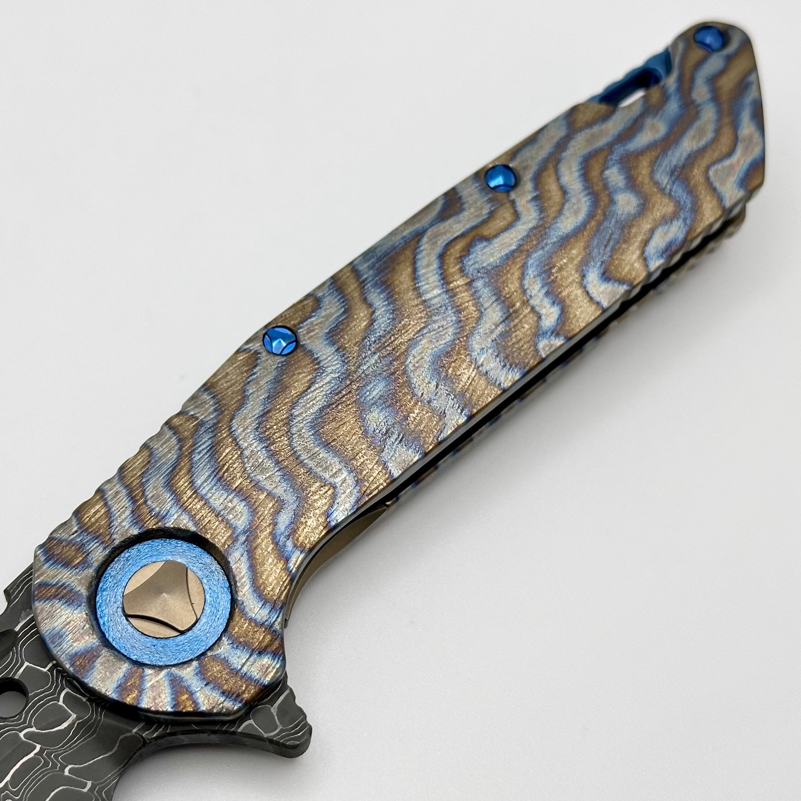 Marfione Custom Knives Warhound Flamed Barked Titanium w/ Blue Ti Hardware & Vegas Forge Stainless Reptilian Damascus Pattern #2