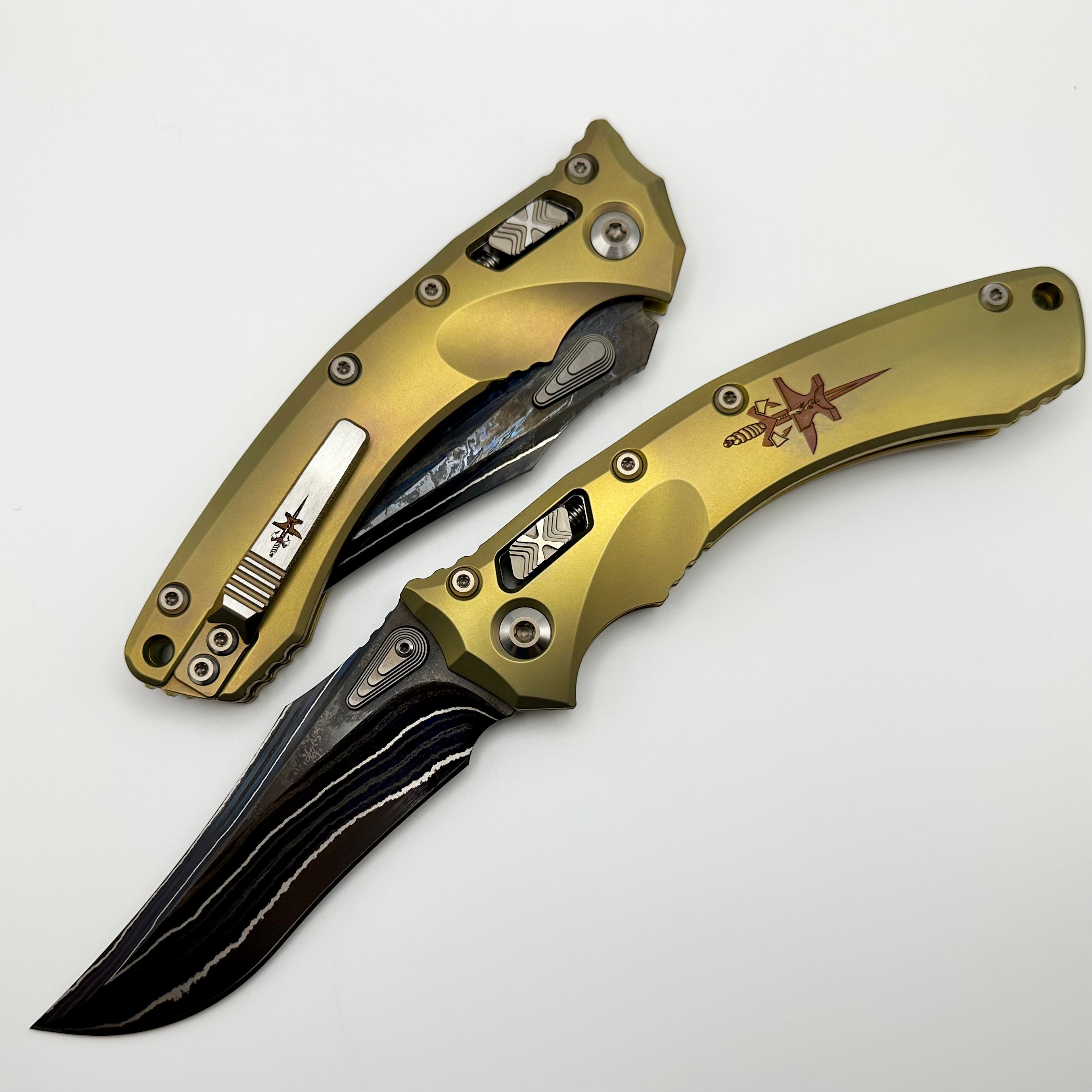 Marfione Custom Knives Amphibian RAM-LOK Metroid Sanmai w/ Nickel Shim Broken Anvil Damascus & Sovereign Gold Stippled Titanium w/ Joint Logo Dagger Engraved & Two Tone Bronzed Hardware