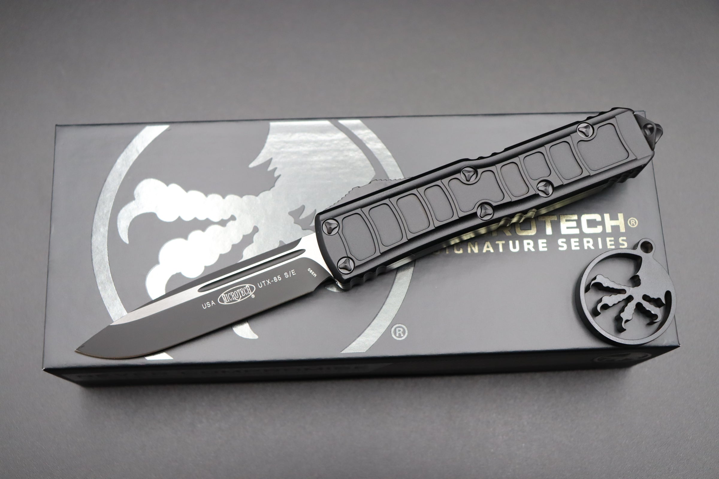 Microtech UTX-85 II Black Stepside 2 w/ Black Single Edge Signature Series 231II-1TS