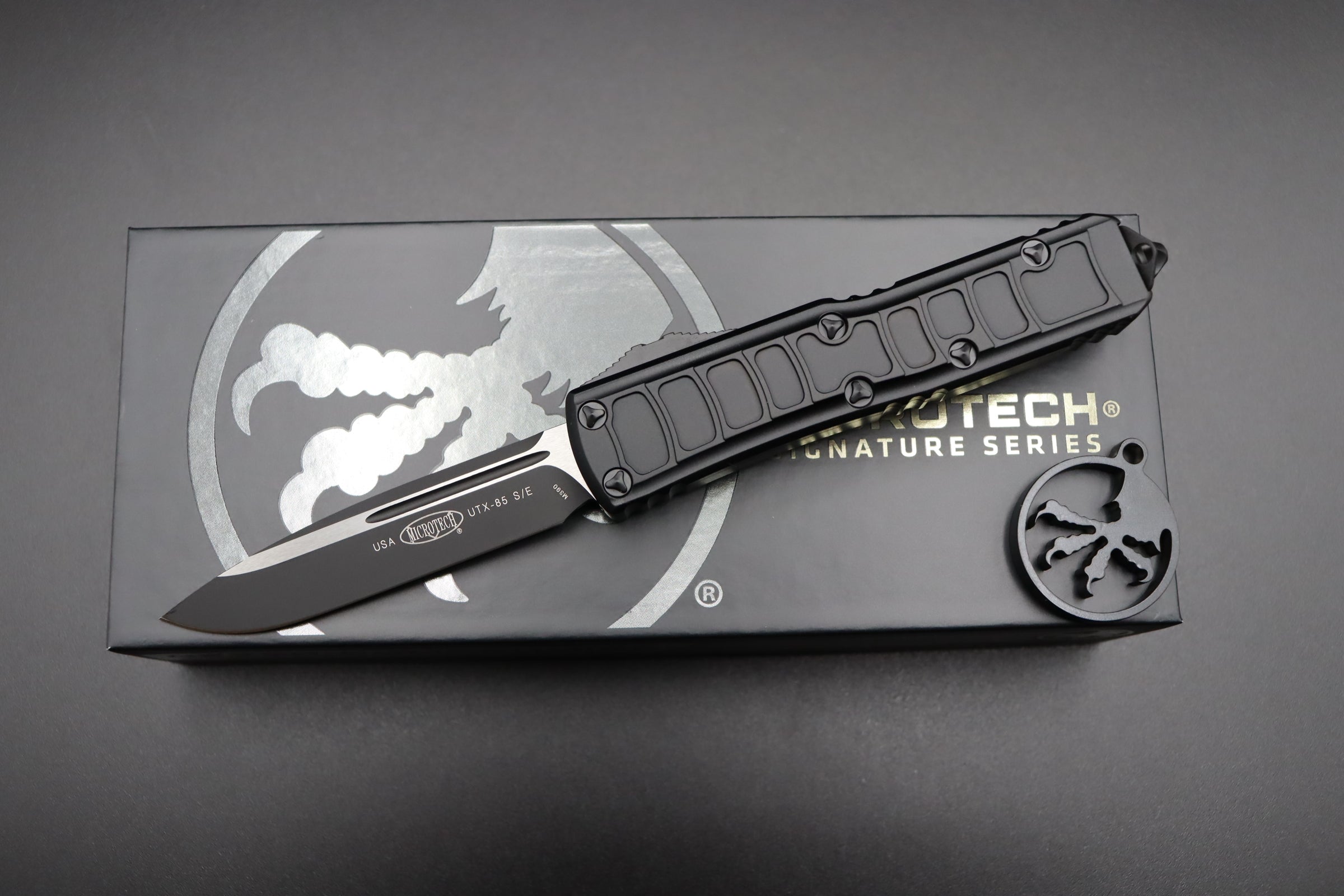 Microtech UTX-85 II Black Stepside 2 w/ Black Single Edge Signature Series 231II-1TS