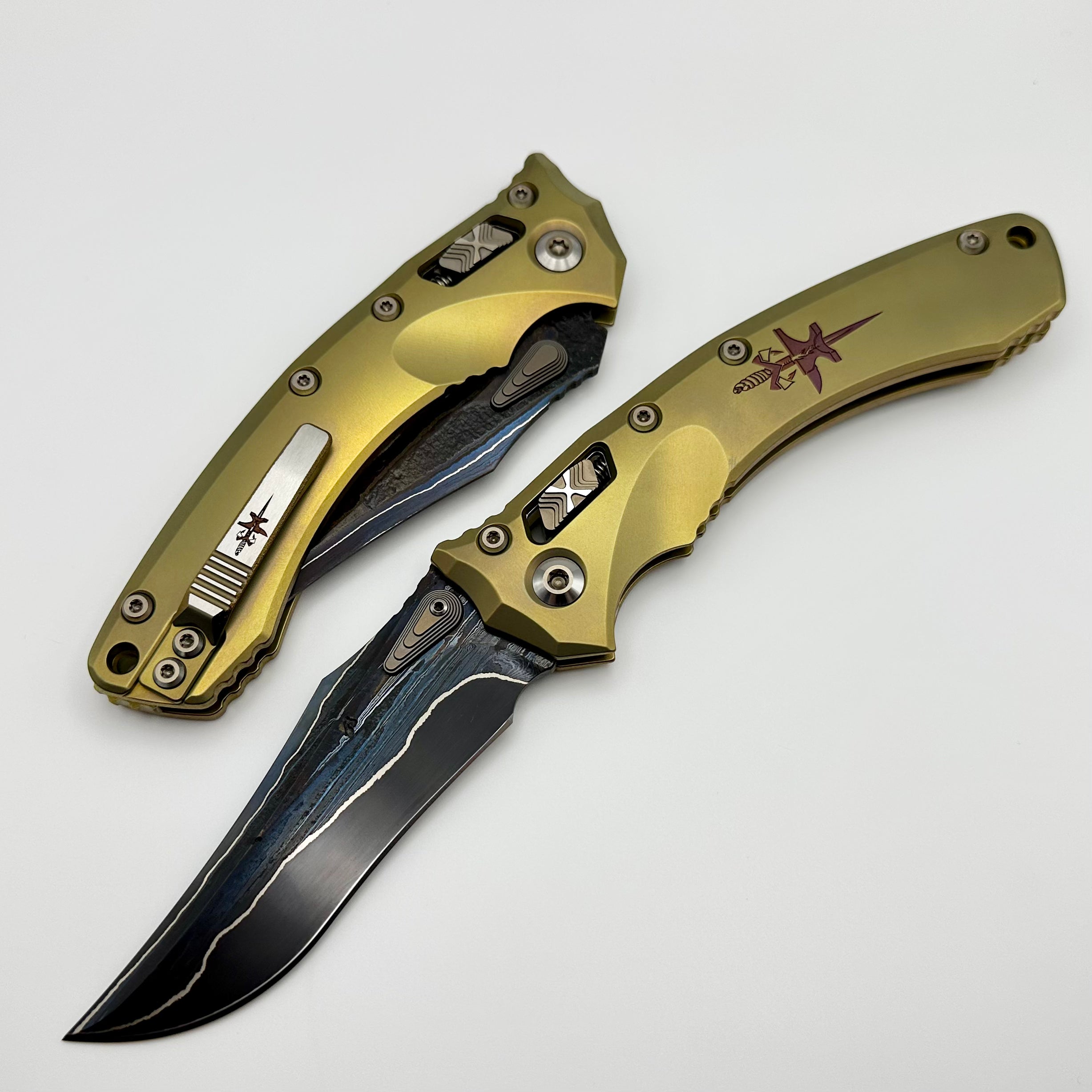 Marfione Custom Knives Amphibian RAM-LOK Terraform Pattern Broken Anvil Damascus & Sovereign Gold Stippled Titanium w/ Joint Logo Dagger Engraved & Two Tone Bronzed Hardware