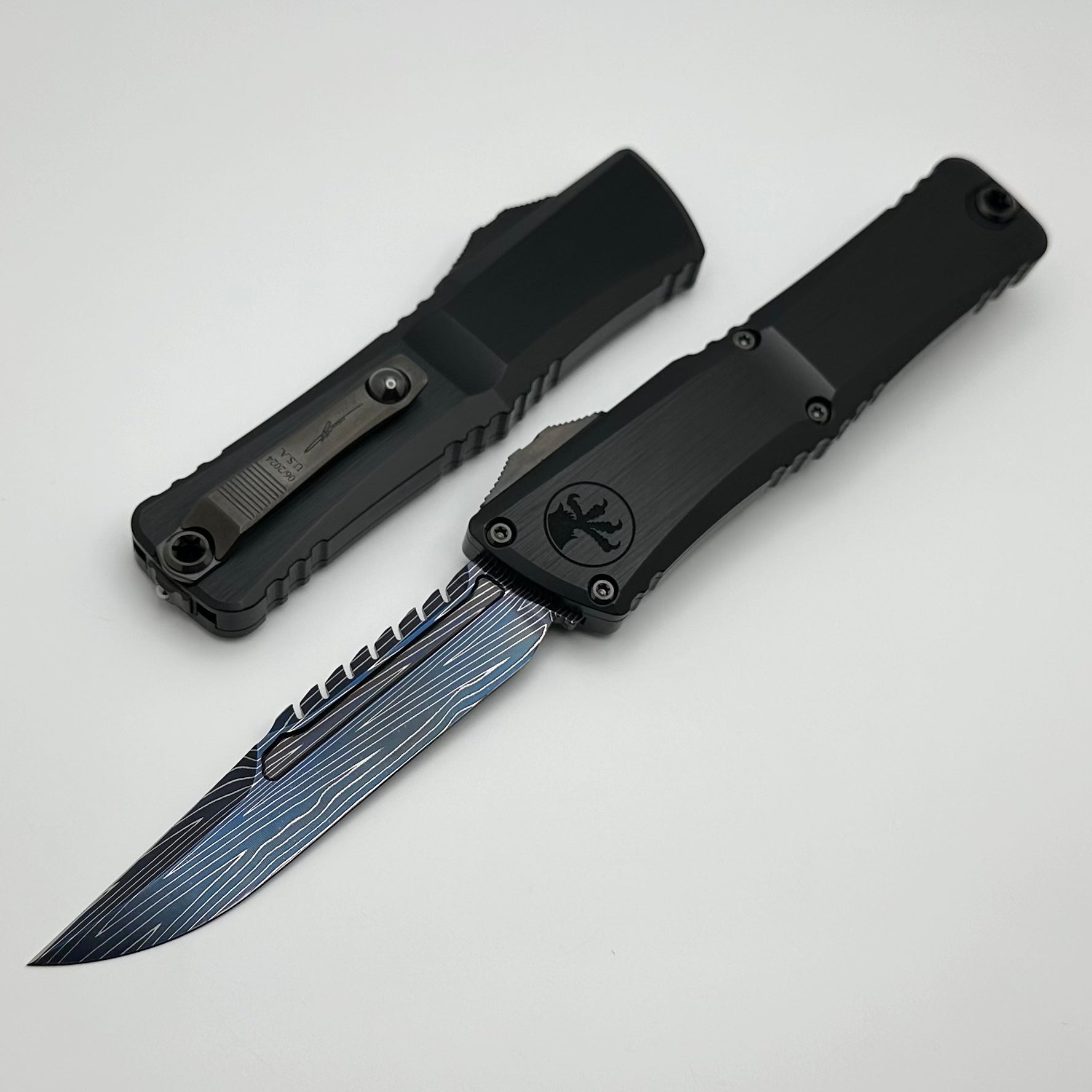 Microtech Knives Combat Troodon Gen III LT Interceptor Vegas Forge Blued Damascus & Black Hefted Handle w/ Two Tone DLC Hardware Signature Series 1217-16MS3