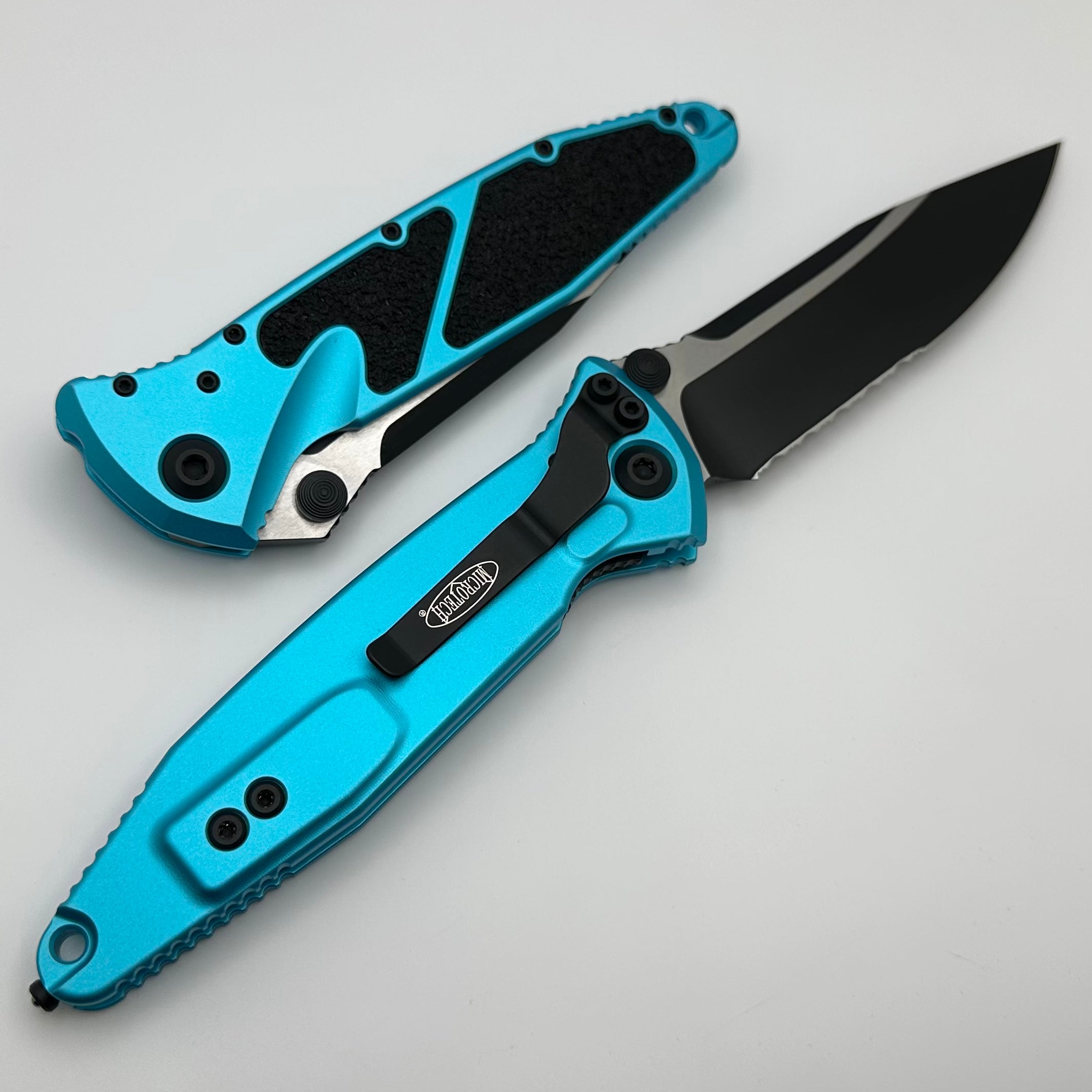 Microtech Socom Elite Manual Black Single Edge Part Serrated w/ Turquoise Handles 160-2TQ