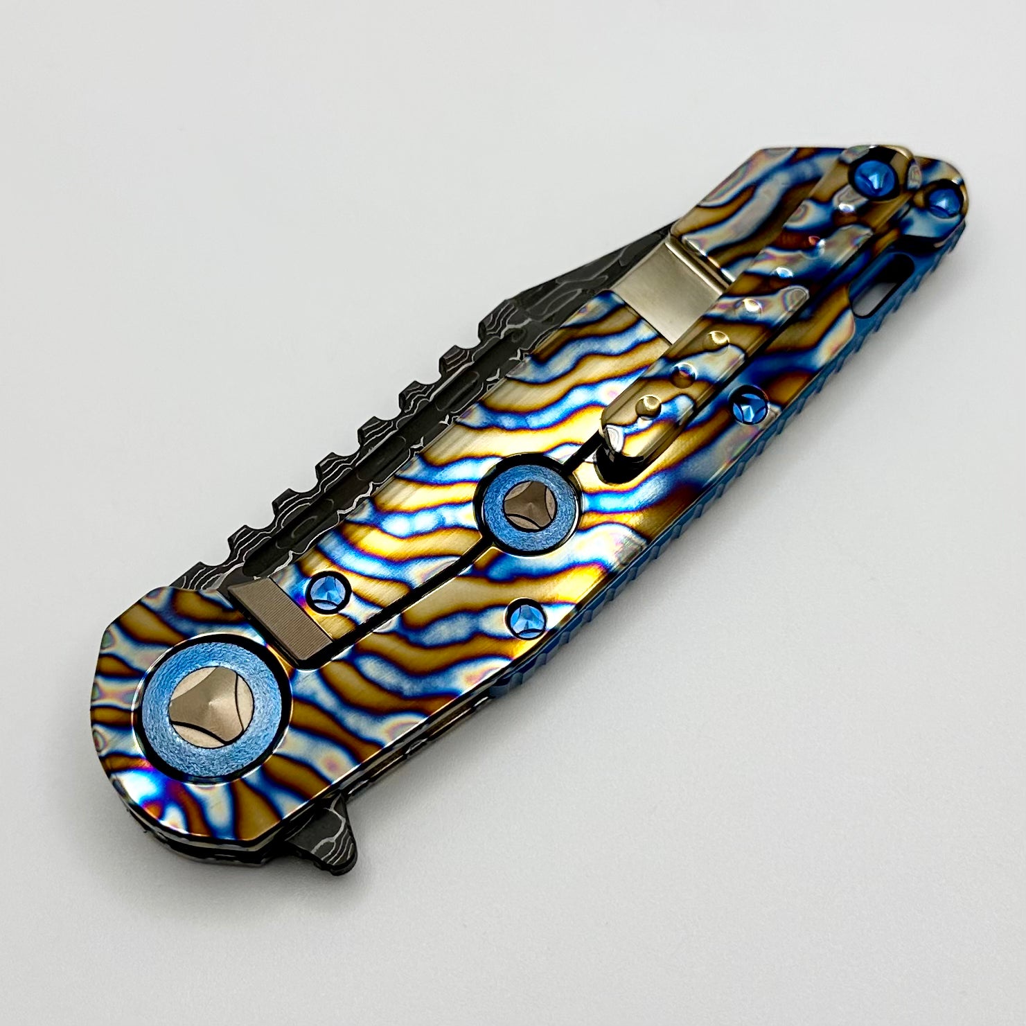 Marfione Custom Knives Warhound Flamed Polished Titanium w/ Blue Ti Hardware & Vegas Forge Stainless Reptilian Damascus Pattern