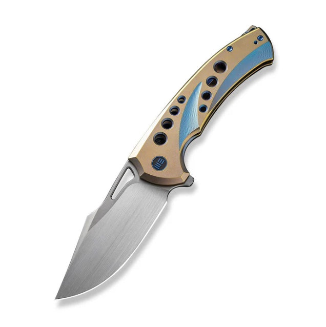 We Knife Swiftfin Golden/Blue Titanium Handles w/ Blue Holes & Hand Satin 20CV WE23051-4