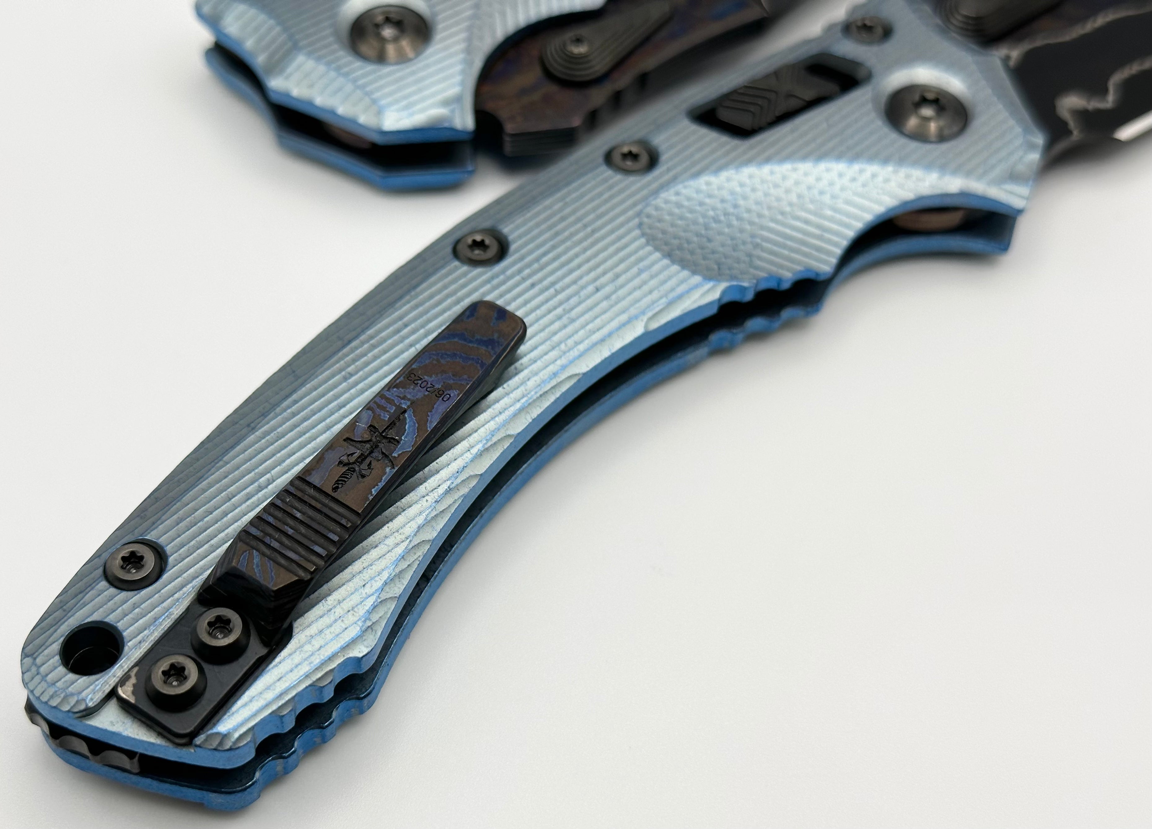 Marfione Custom Knives Amphibian RAM-LOK Brute de Forge Metroid Broken Anvil Damascus & Fluted Ice Blue Stippled Titanium