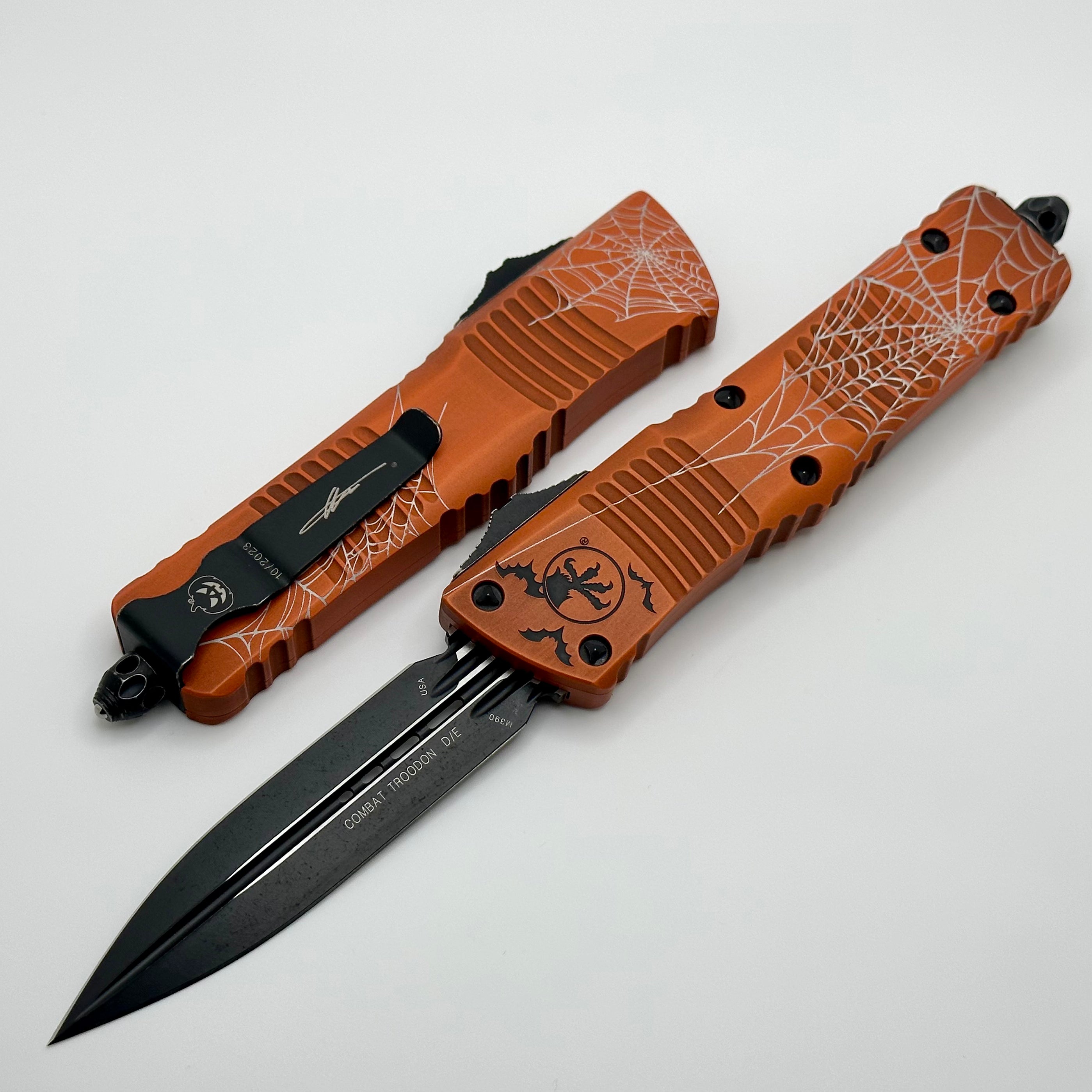 Microtech Combat Troodon D/E Halloween Web Orange Fluted Standard 23’ 142-1HWWS