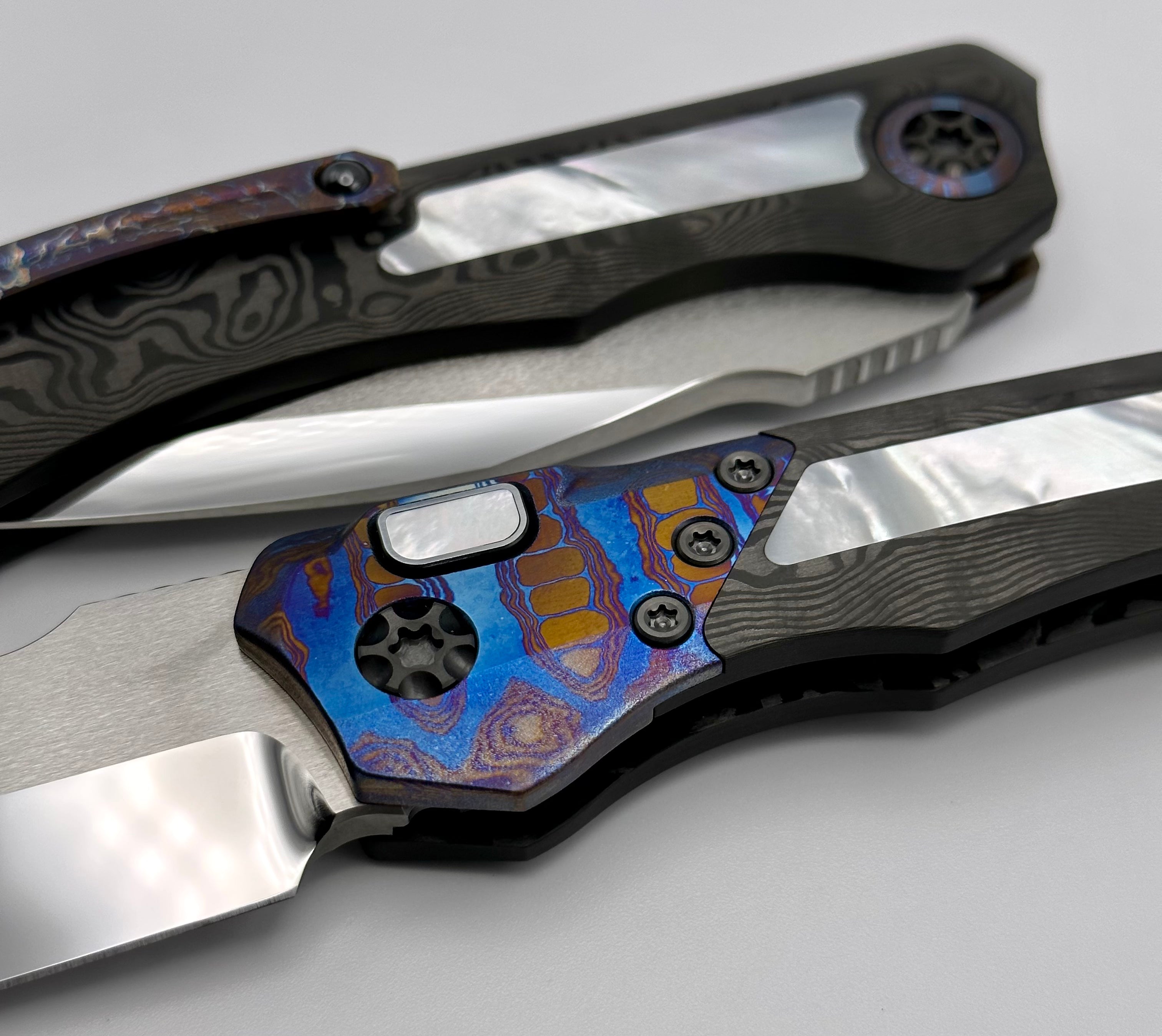 Heretic Knives Wraith Auto w/ Black Dunes Fat Carbon, Two Tone Finished Vegas Forge Damtanium Bolsters, & Mother of Pearl Inlays & Hand Ground Mirror Polished Elmax Blade