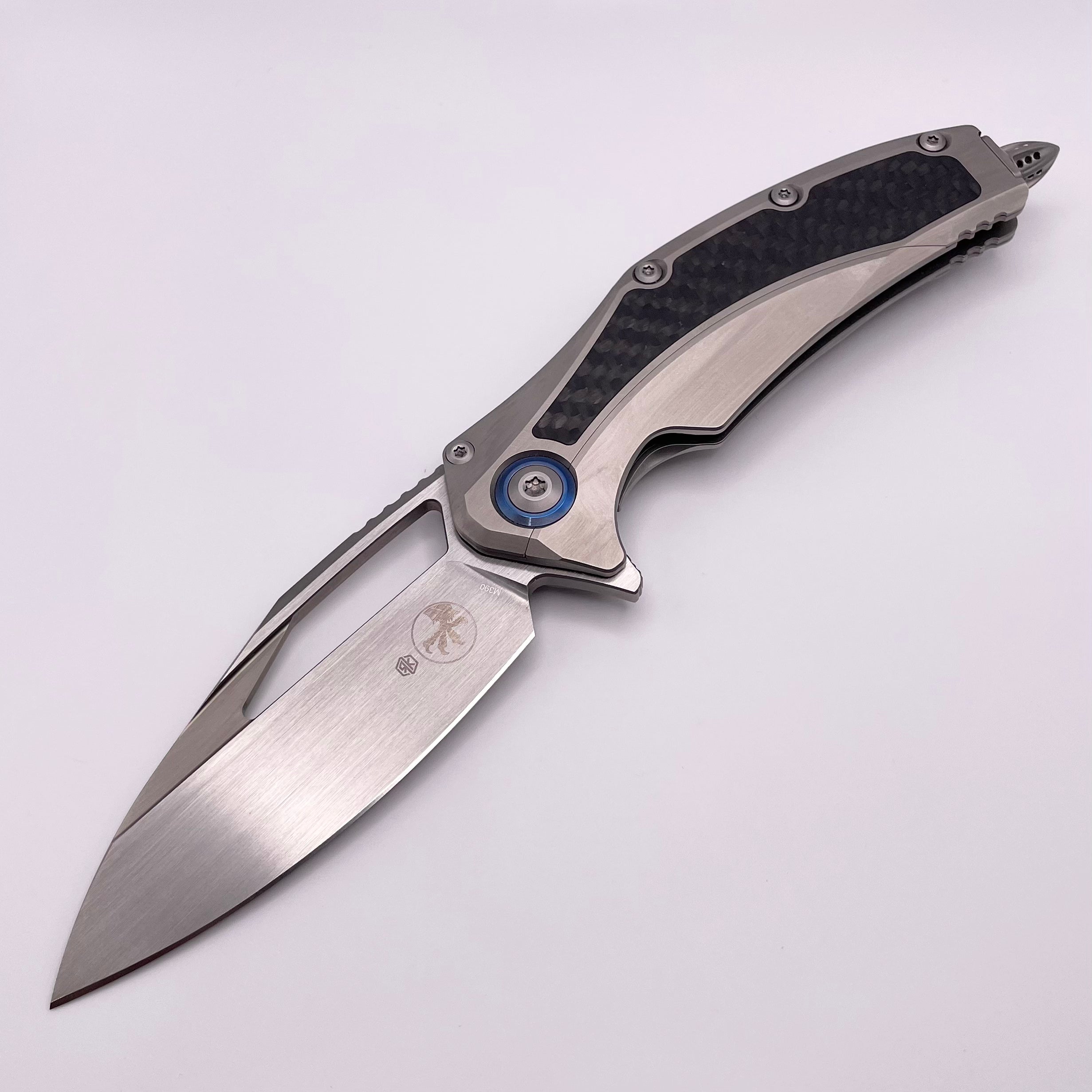 Pre Owned Microtech Matrix Titanium w/ Carbon Fiber Inlays & Blue Ti Pivot Collars w/ Hand Satin M390 165C-4CFITI