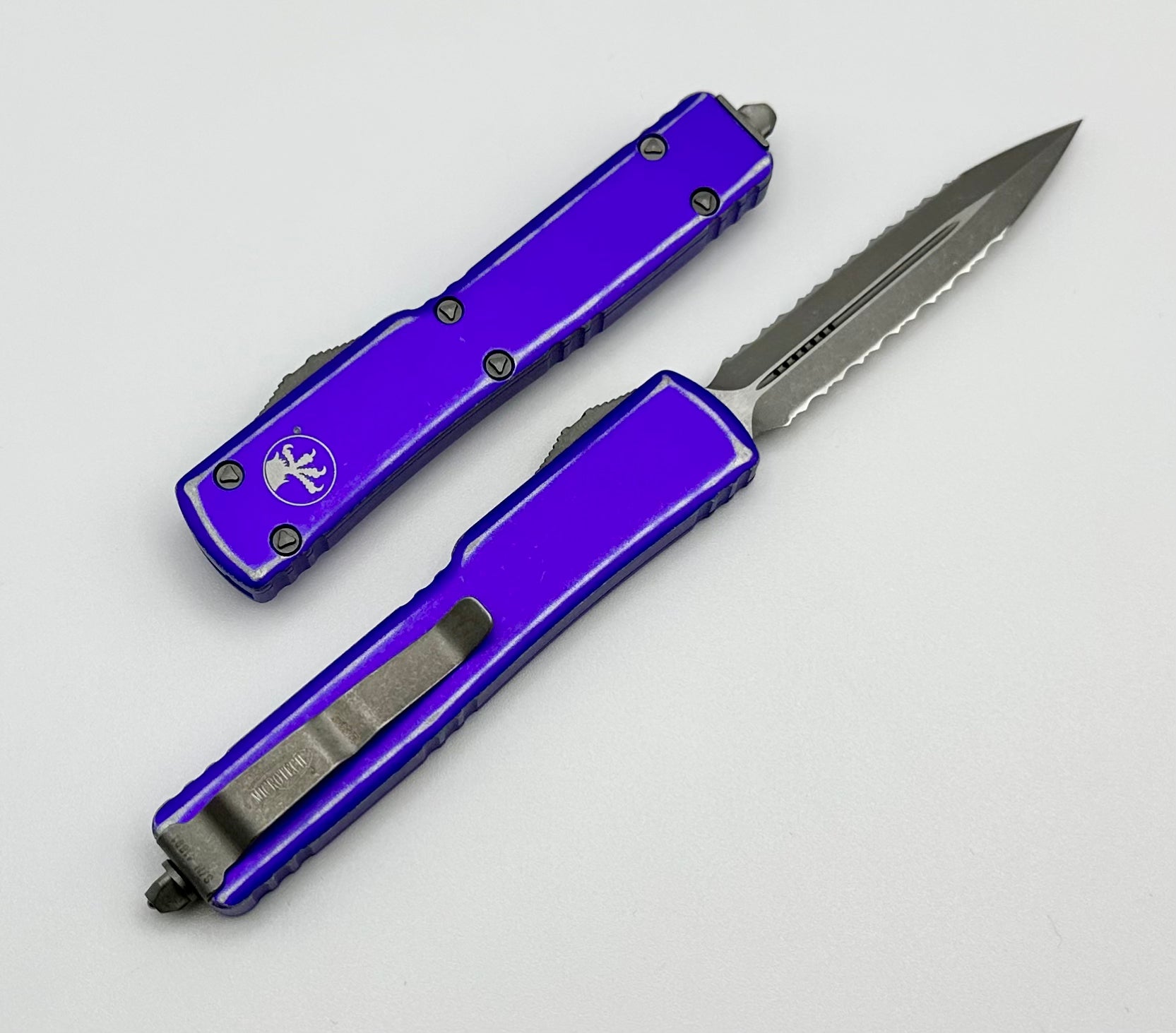 Microtech UTX-70 Double Edge Double Fully Serrated Apocalyptic & Distressed Purple 147-D12DPU