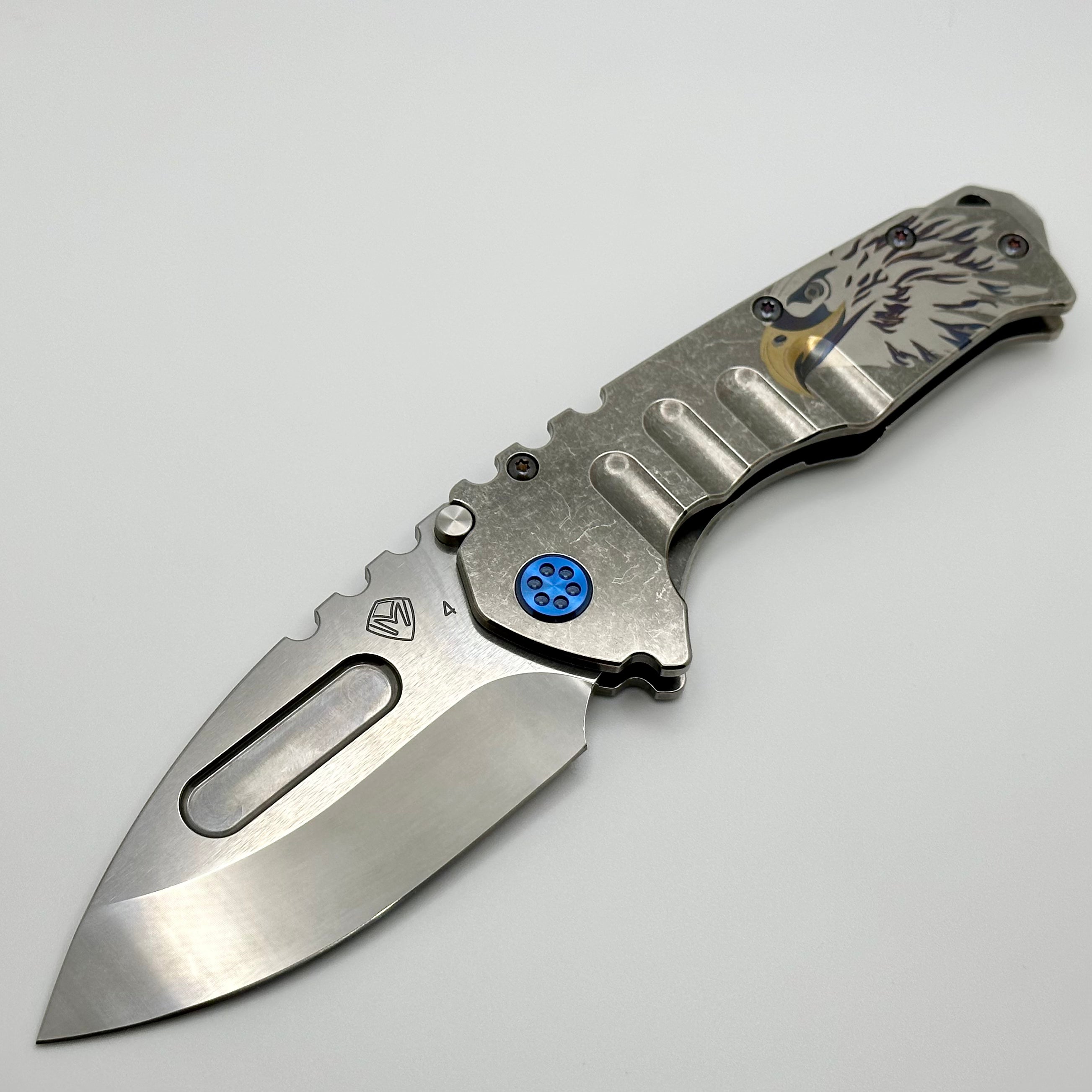 Medford Knife Praetorian T Drop Point Tumbled S45 & Tumbled Patriotic Eagle Engraved Handle w/ Blue Hardware/Clip