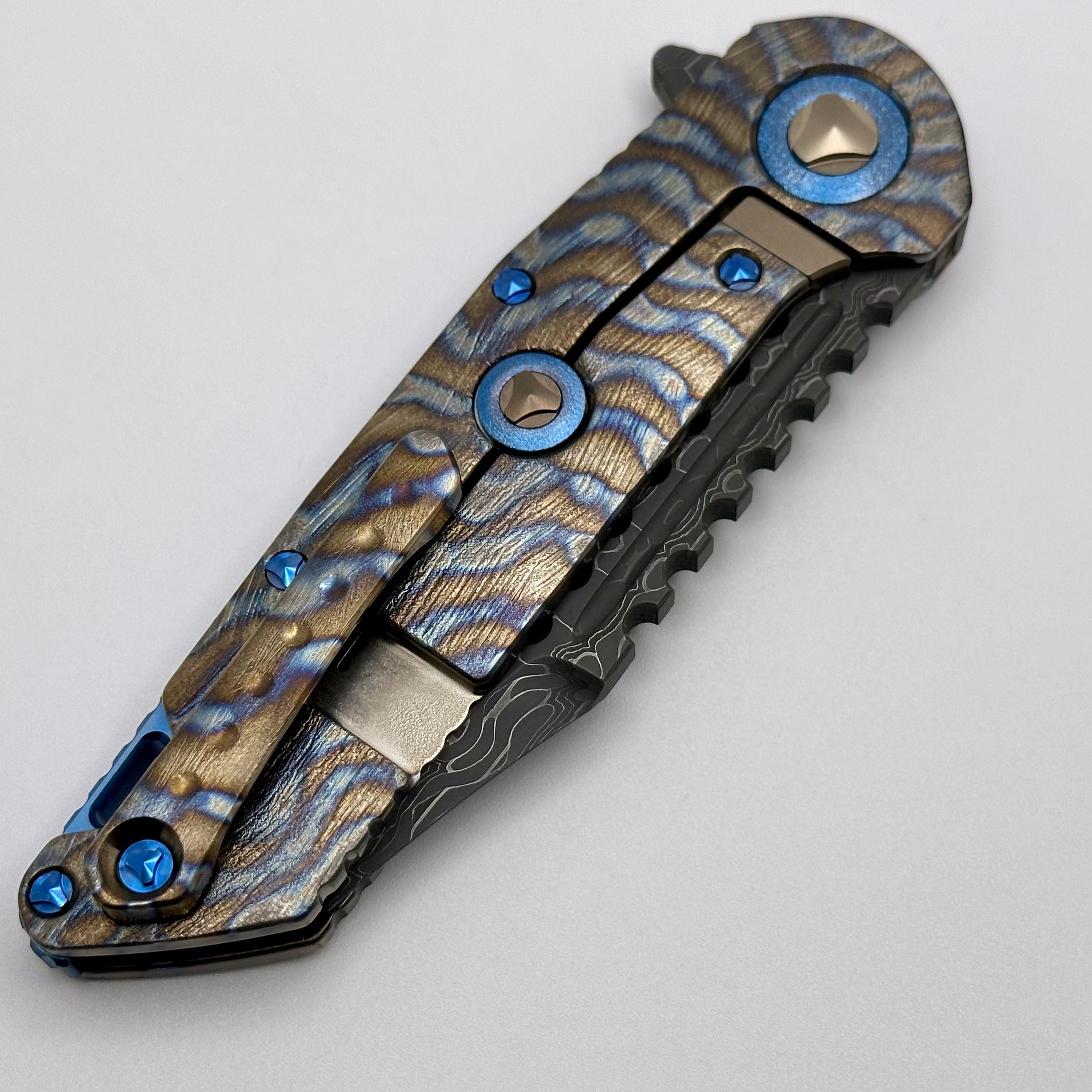 Marfione Custom Knives Warhound Flamed Barked Titanium w/ Blue Ti Hardware & Vegas Forge Stainless Reptilian Damascus Pattern #2