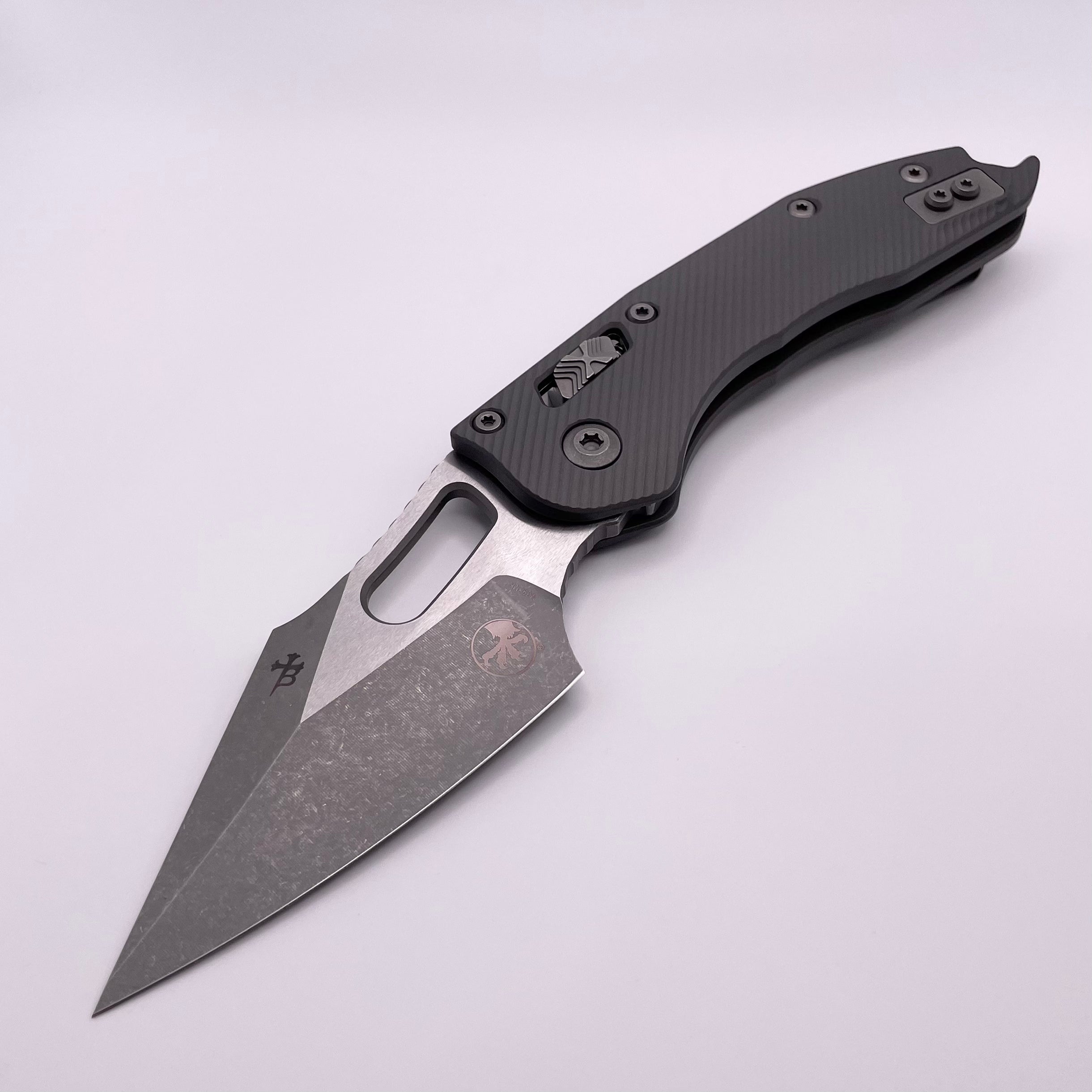 PRE OWNED Microtech Knives Manual Stitch RAM LOK Fluted Apocalyptic Natural Clear M390MK 169RL-10APFLNC