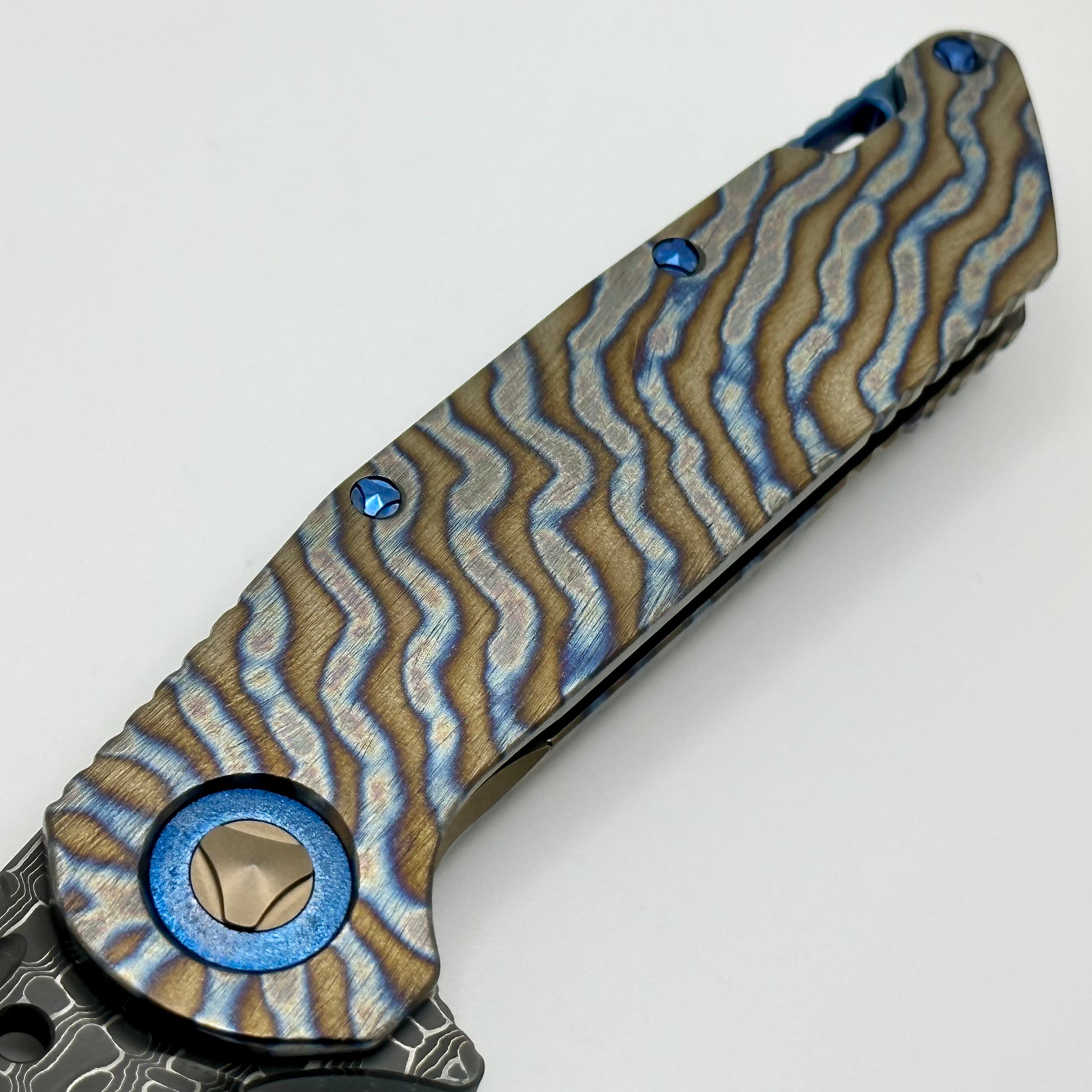 Marfione Custom Knives Warhound Flamed Barked Titanium w/ Blue Ti Hardware & Vegas Forge Stainless Reptilian Damascus Pattern #1