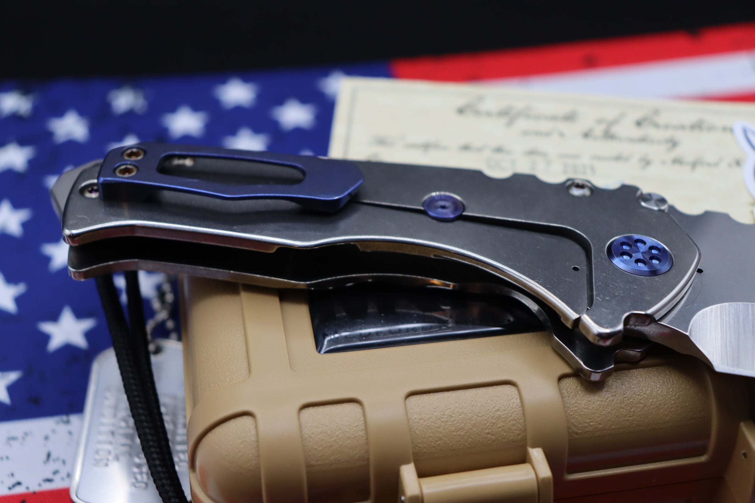 Medford Knife Praetorian T “We The People” Engraved & Blue Hardware with S35 Drop Point 106-047